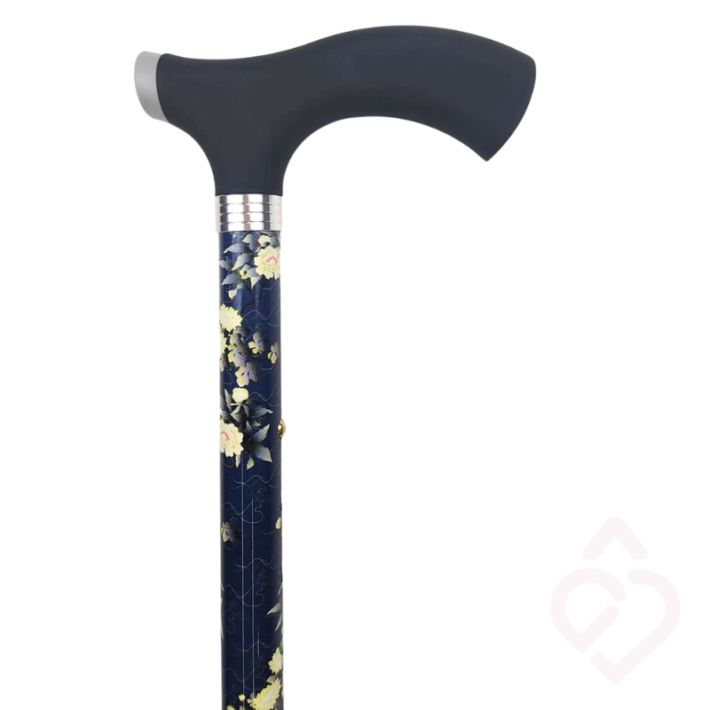 Detalhe do punho macio preto e da haste azul com padrão floral