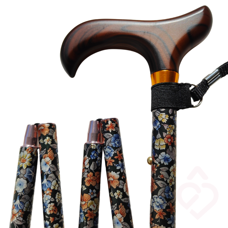 Bengala dobrável com padrão floral e cordão, compacta quando dobrada para facilitar o transporte e a arrumação.