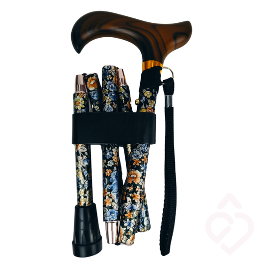 Bengala dobrável com padrão floral e cordão, compacta quando dobrada para facilitar o transporte e a arrumação.