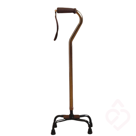 Bengala quadripé bronze com base de quatro apoios, que proporciona maior estabilidade e segurança durante a marcha. Possui pega confortável e correia de pulso, oferecendo apoio adicional a pessoas com dificuldades de equilíbrio ou mobilidade.