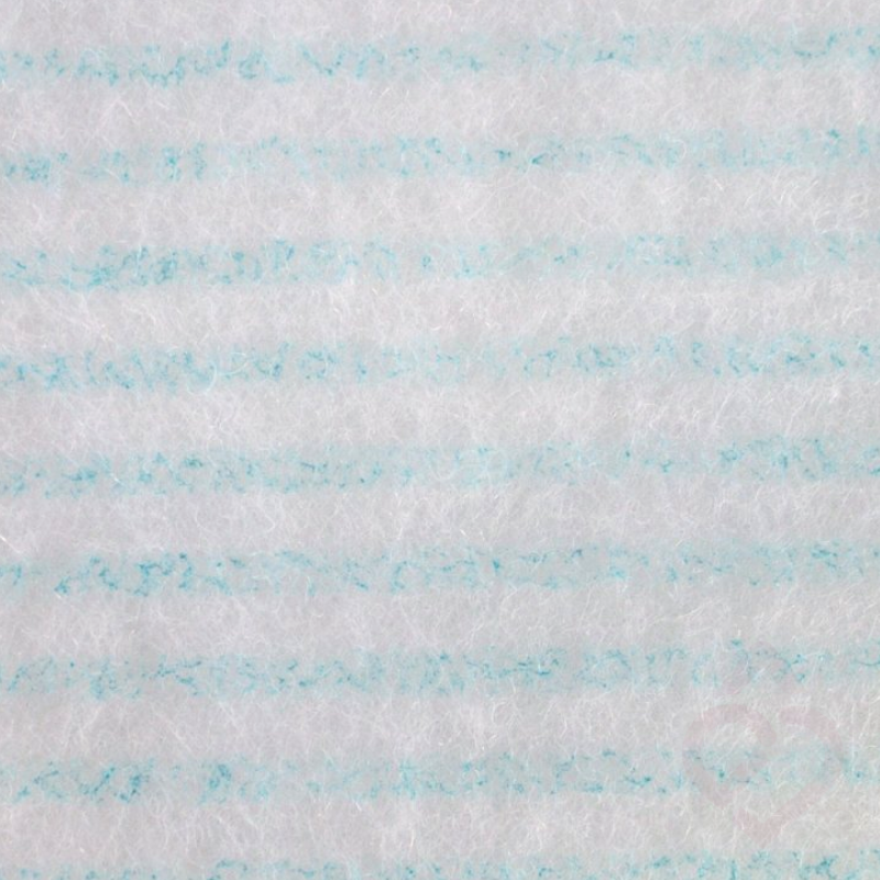 Pormenor da textura fibrosa de uma esponja ensaboada descartável, concebida para proporcionar uma limpeza corporal suave e prática.