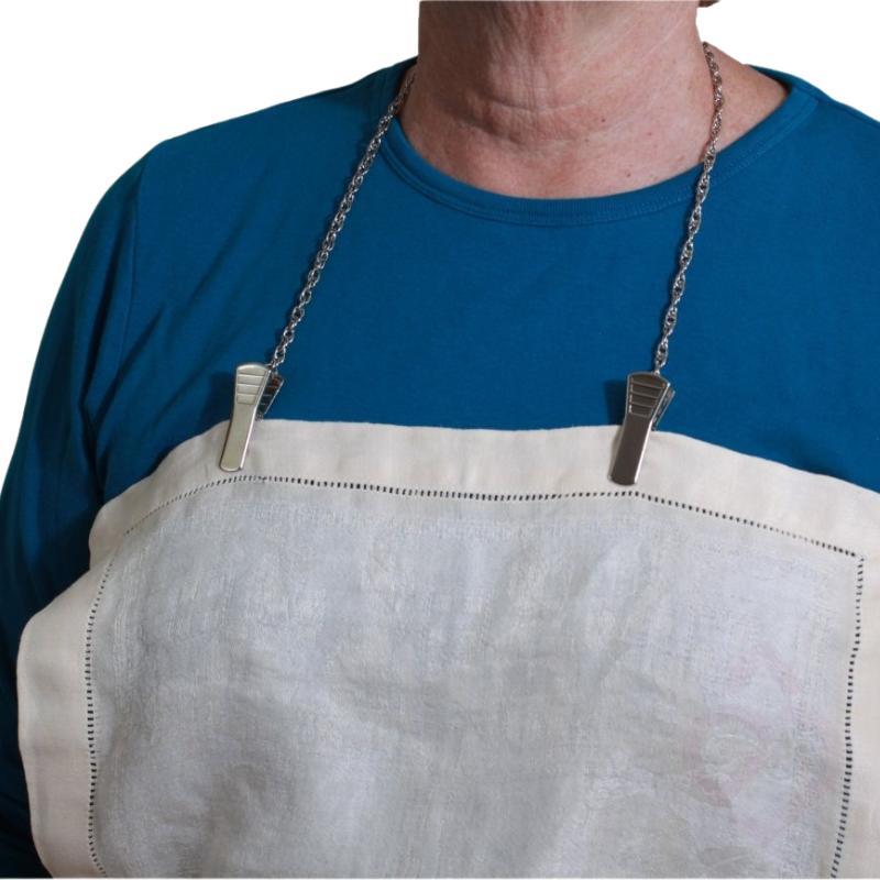 Fio prende-guardanapo com molas para manter o guardanapo seguro durante as refeições