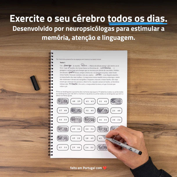 Pessoa a utilizar o Infinitebook infinitaMente II para treino cognitivo