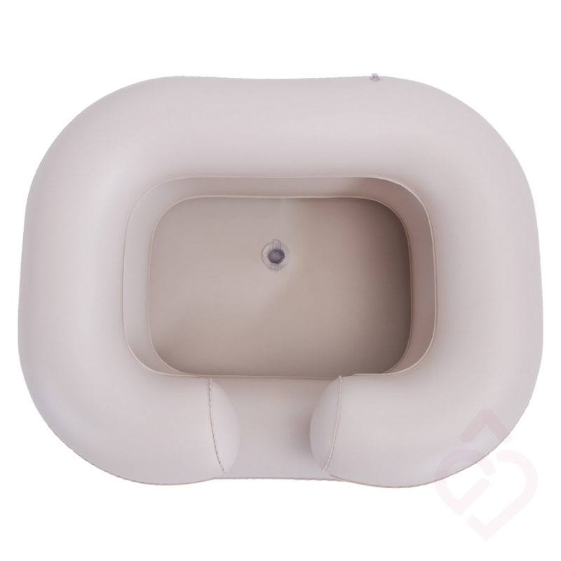 Lava-cabeça insuflável para cama com apoio para o pescoço e abertura central para facilitar a lavagem do cabelo na cama